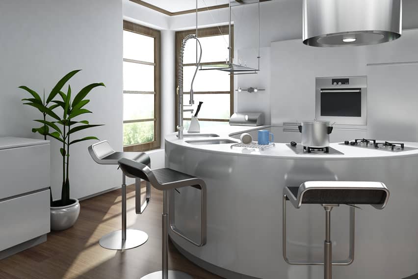 Curved modern kitchen in white with stainless bar stools