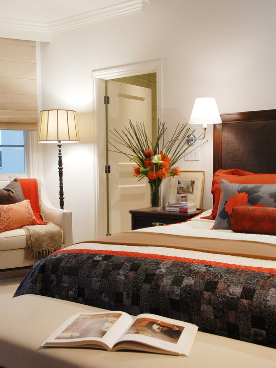 Теплые оранжевые оттенки в оформлении спальной комнаты